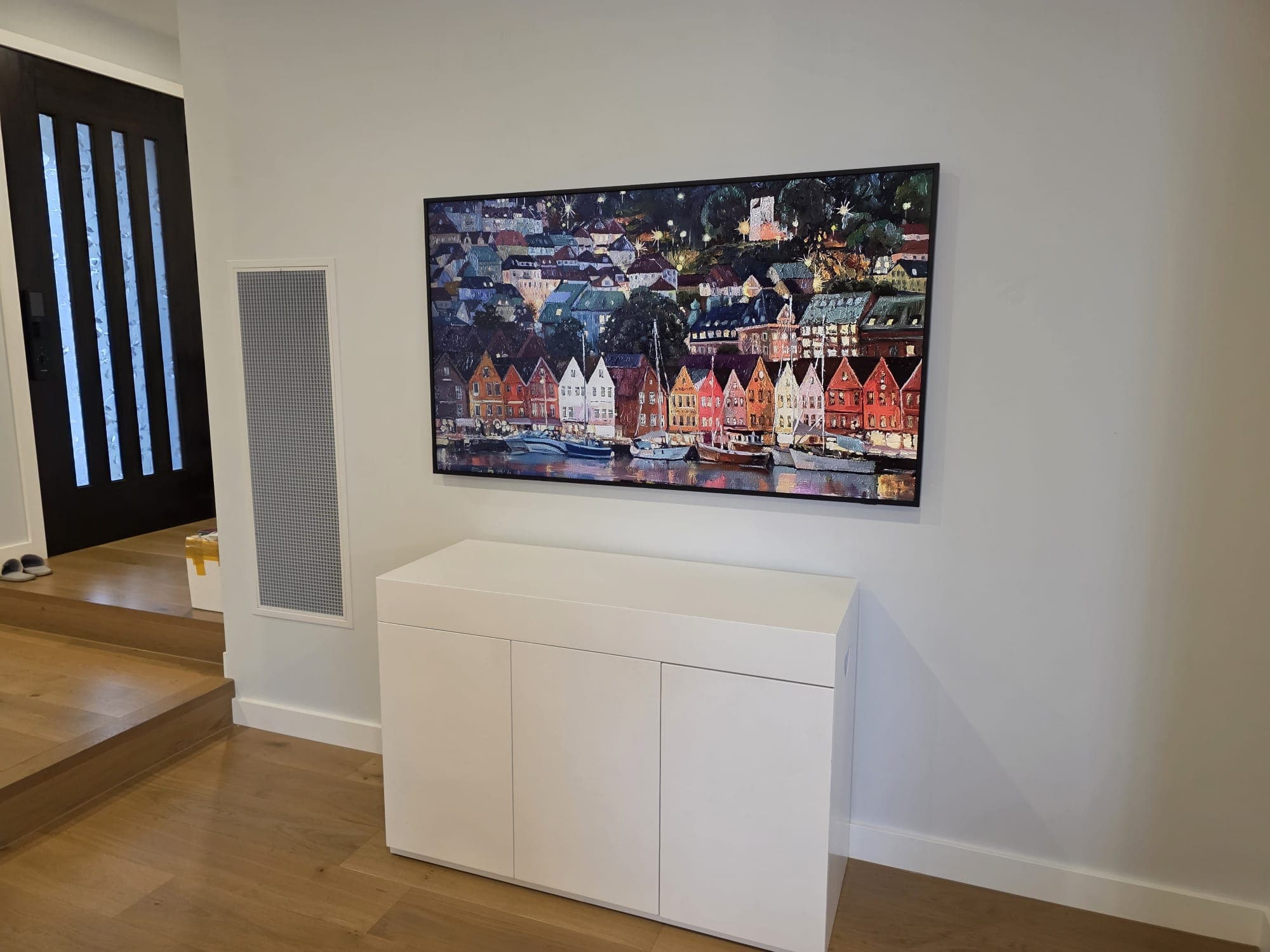 Feature-wall TV installation after handover