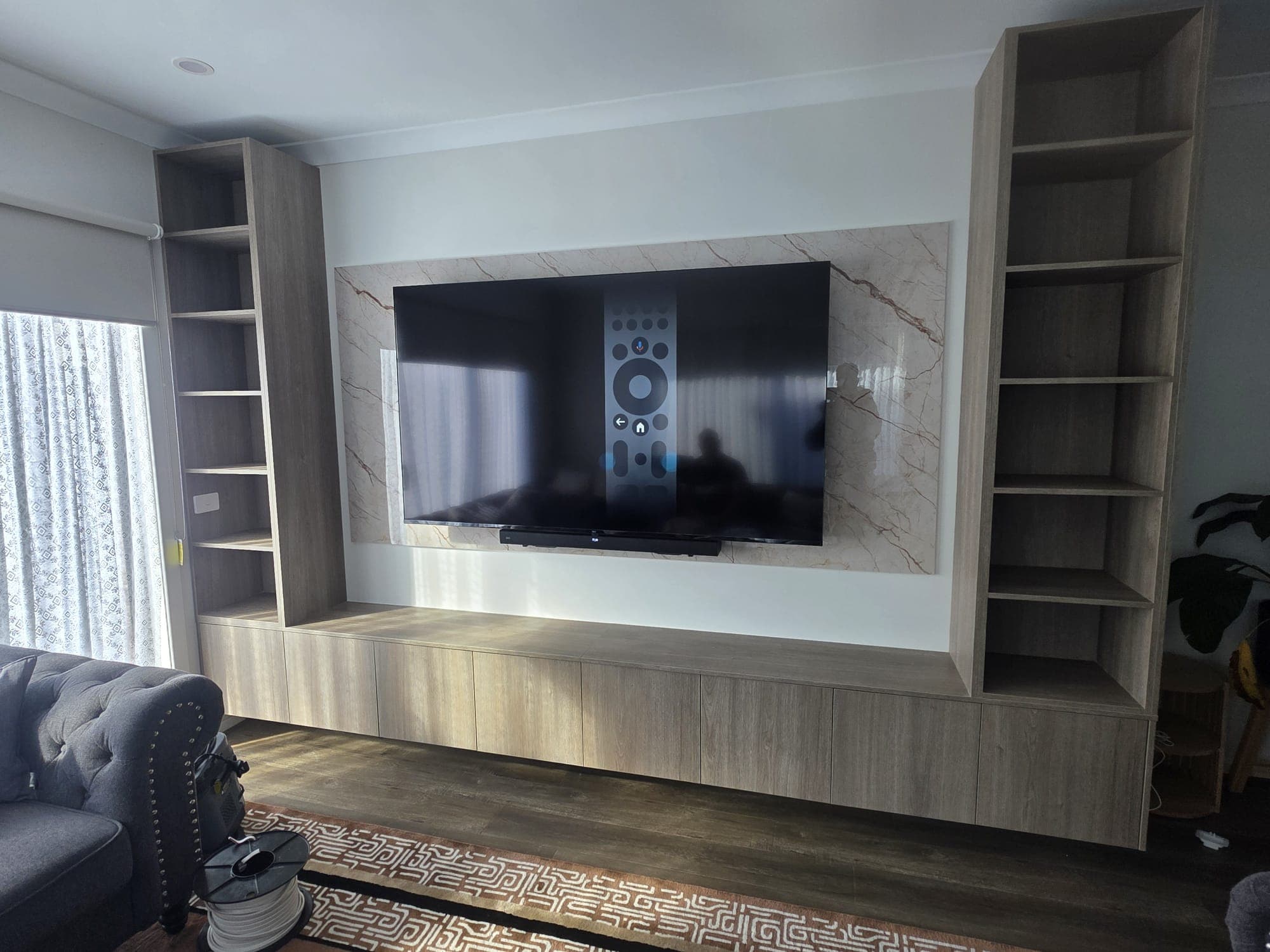 Large-screen wall mount in a Melbourne lounge