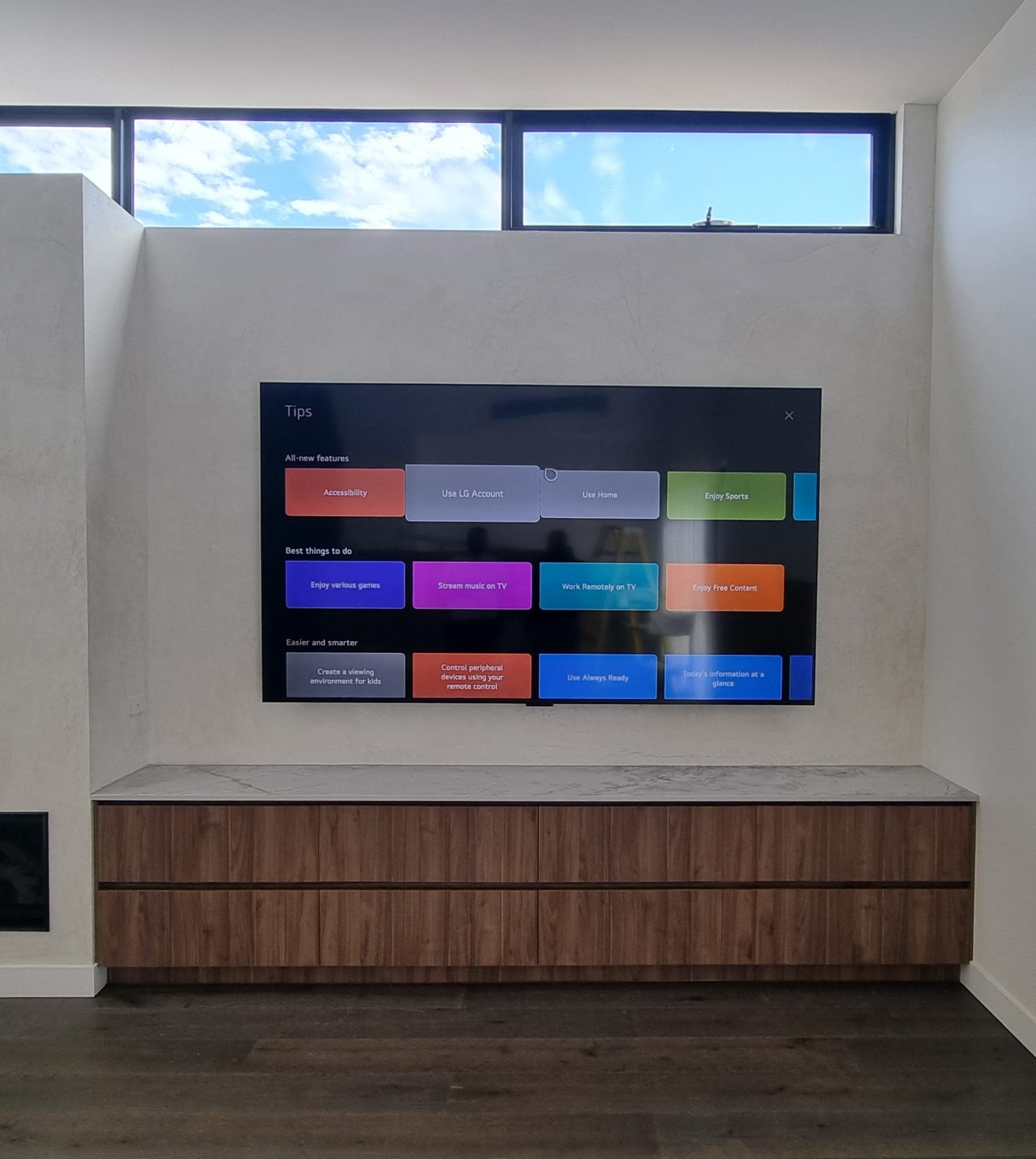 LG TV install under a clerestory window