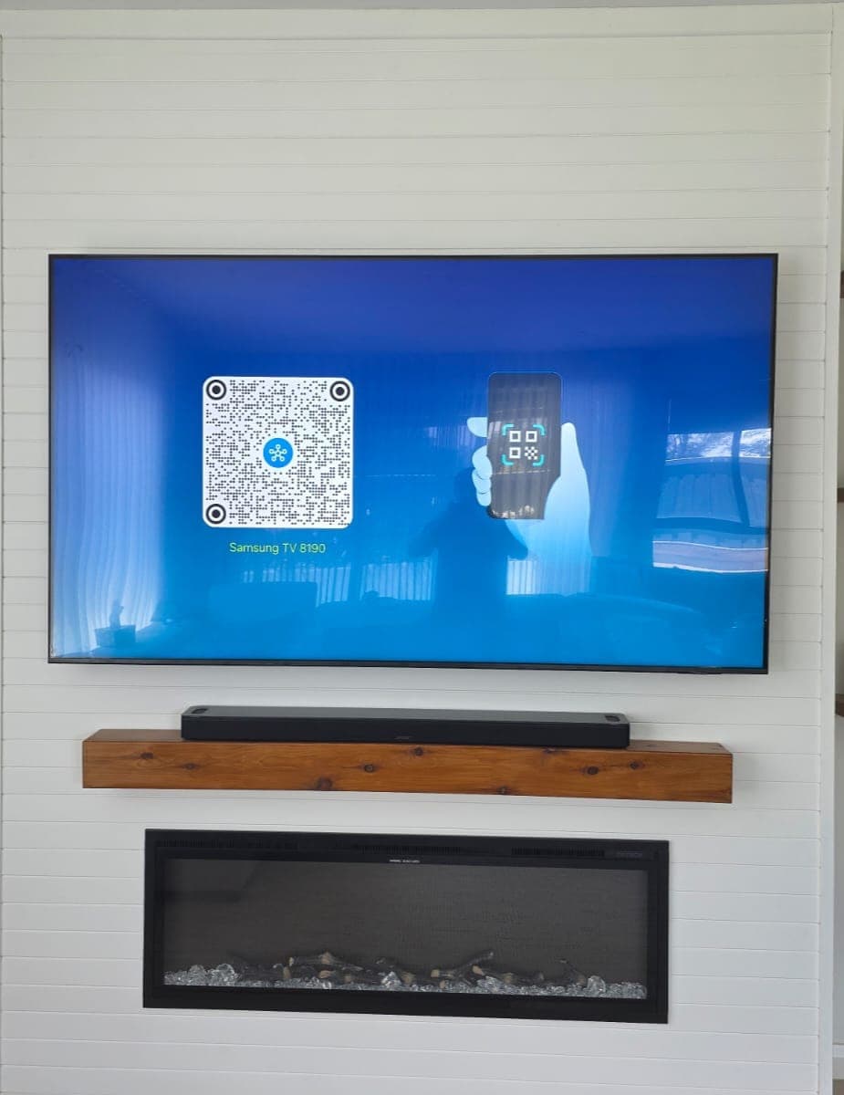 Portrait view of a shiplap fireplace TV mount
